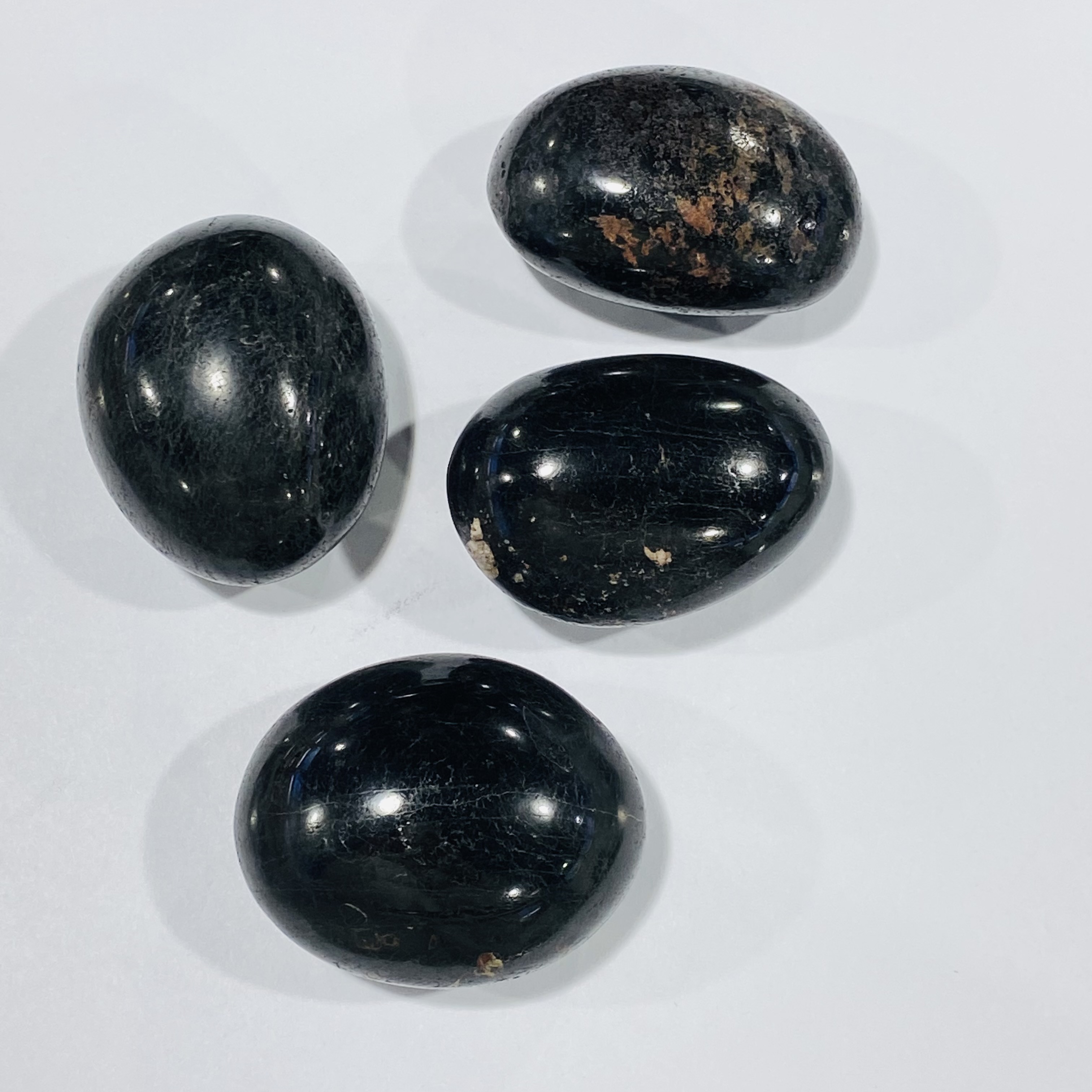 Wholesale high quality natural gemstone healing polishing black tourmaline crystal palm stone for Feng Shui