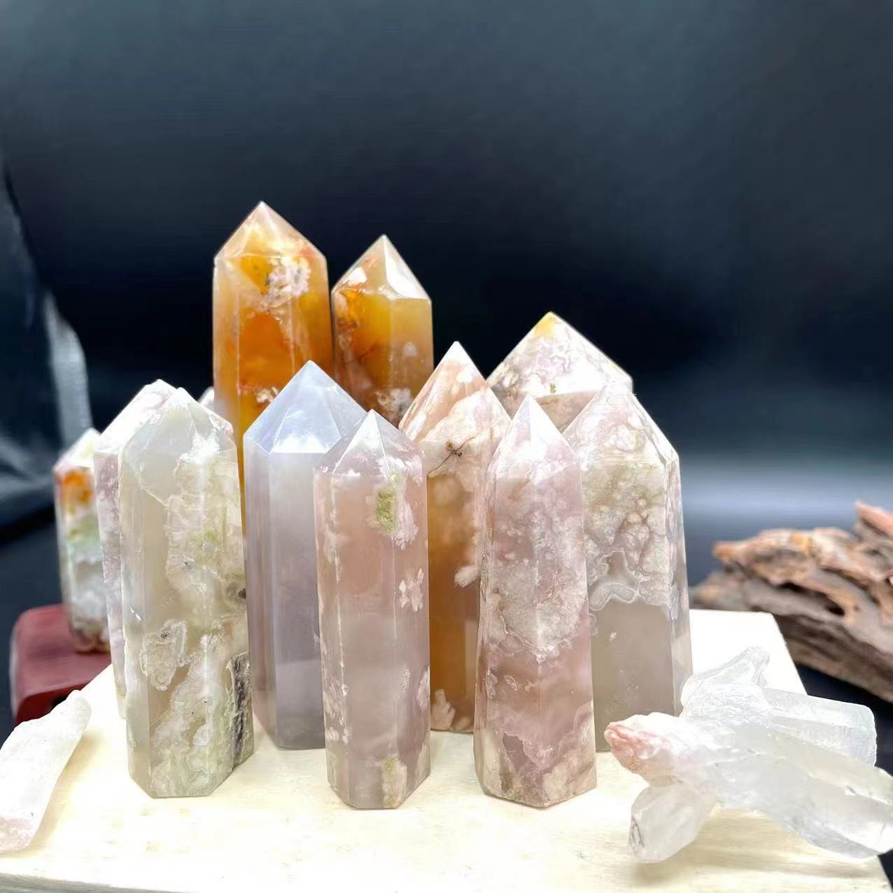 Top quality polished natural healing cherry blossom agate cave crystal towers point wholesale for decoration