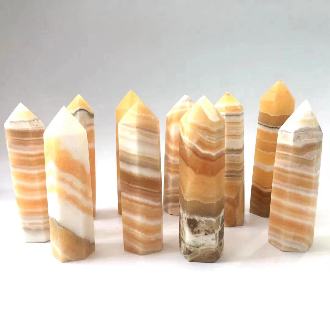 Wholesale bulk healing crystal stone natural polished orange calcite crystals gem point tower for decoration