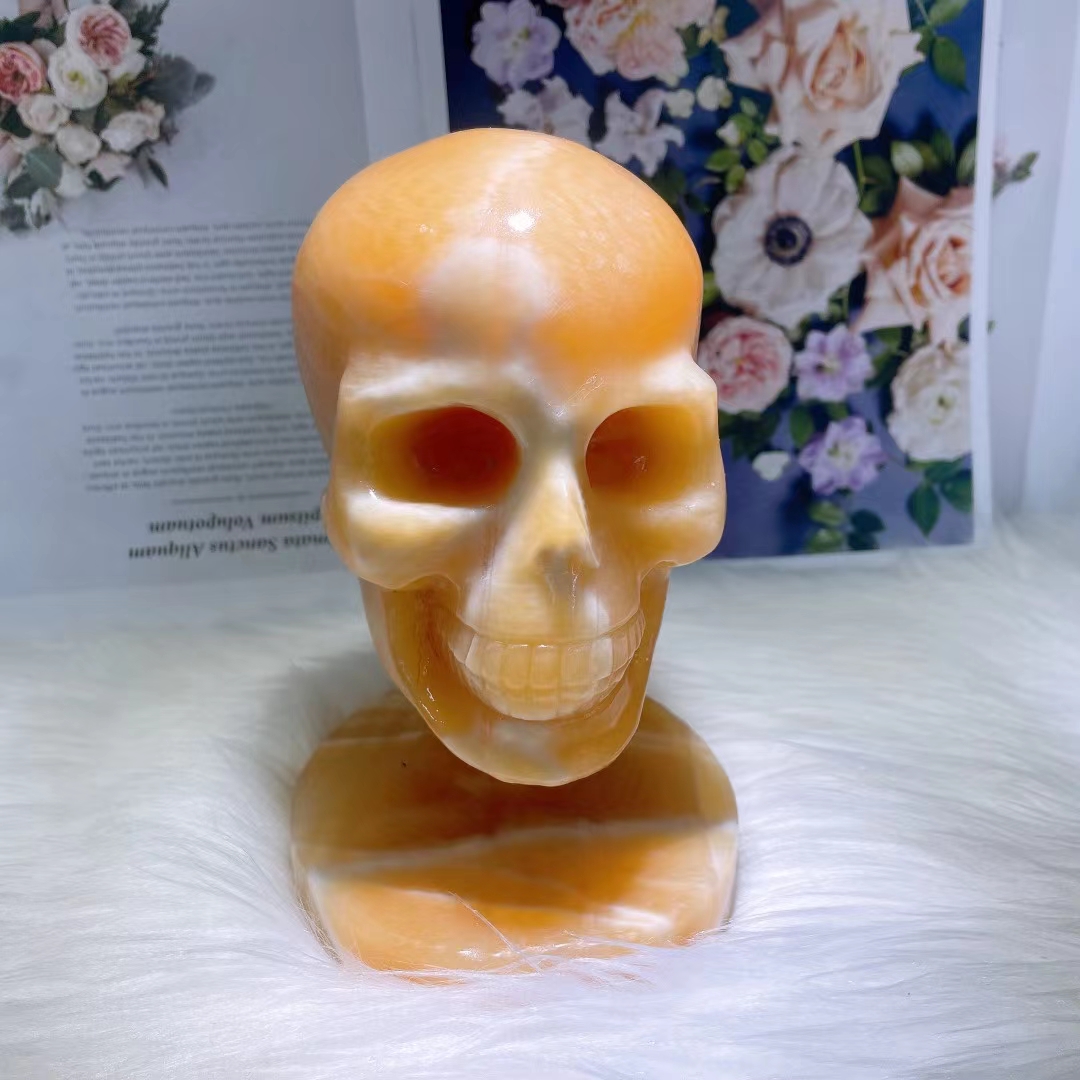 Polished healing hand carved skulls wholesale natural yellow calcite crystal carving skull for crafts gifts