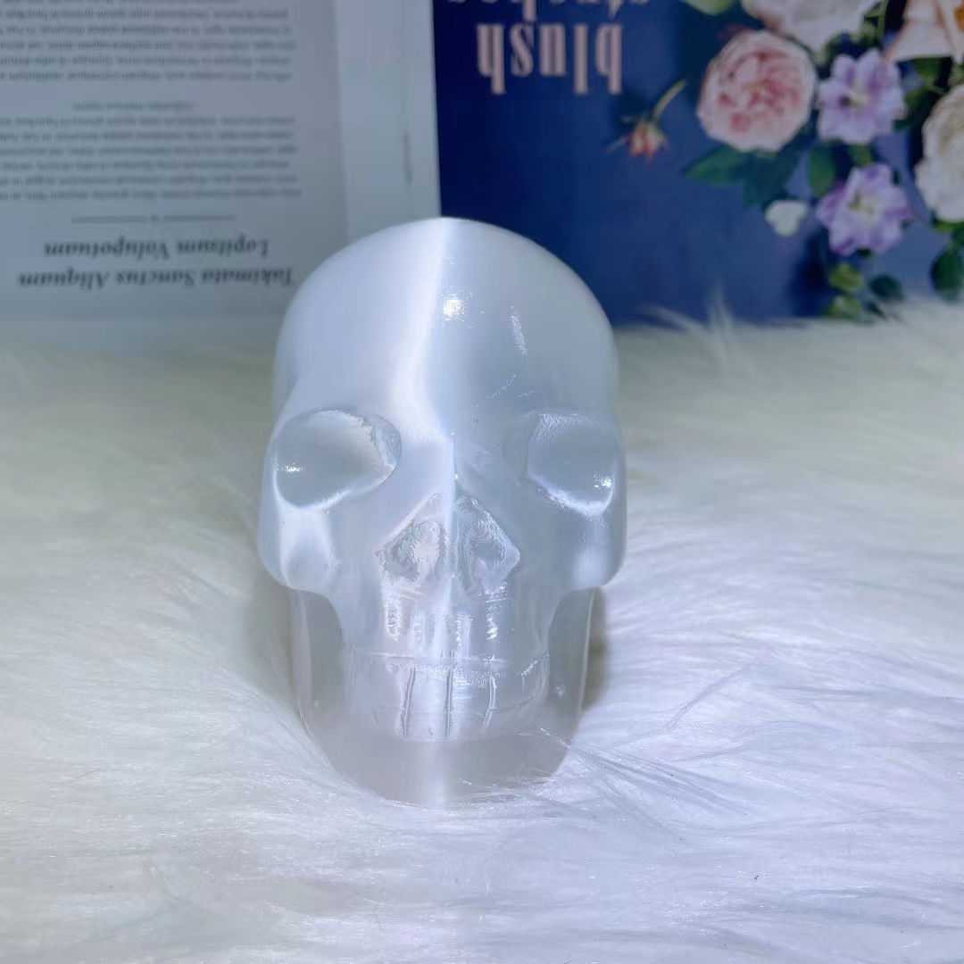 Natural hand carved skull wholesale healing clear gypsum crystal skulls carving crafts for home decoration