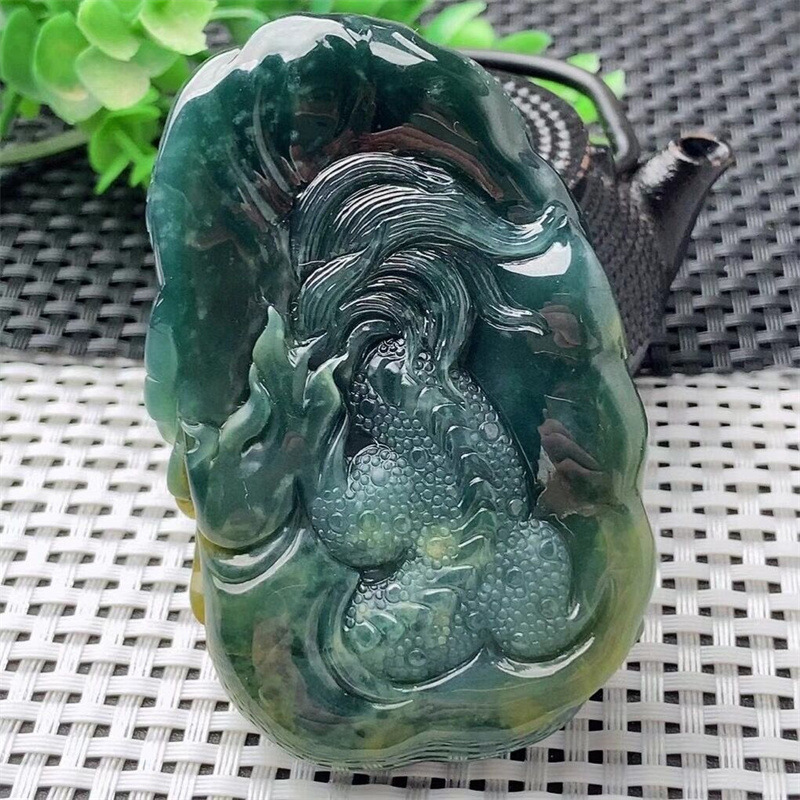 High quality natural gemstones are custom-carved on a Burmese jade dragon plate necklace jade pendant