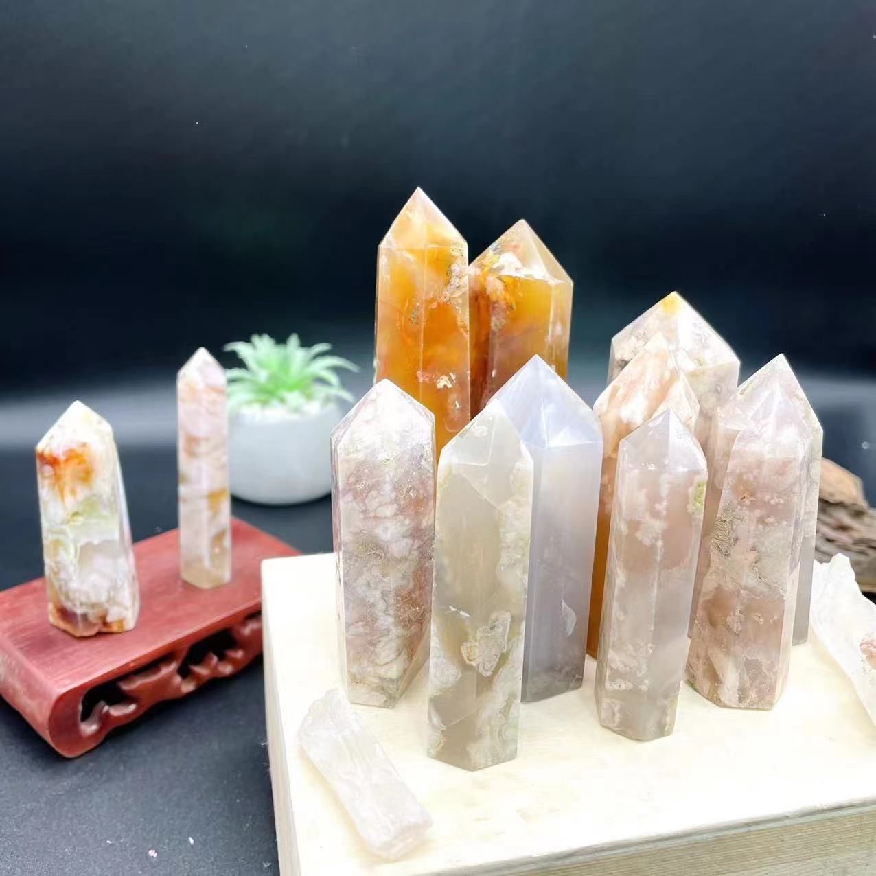 Top quality polished natural healing cherry blossom agate cave crystal towers point wholesale for decoration