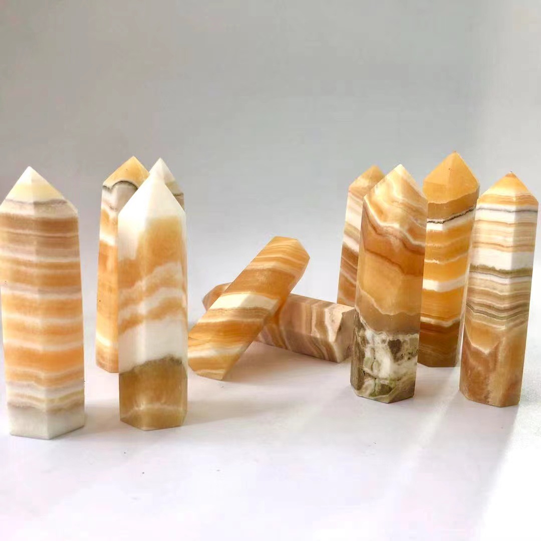 Wholesale bulk healing crystal stone natural polished orange calcite crystals gem point tower for decoration