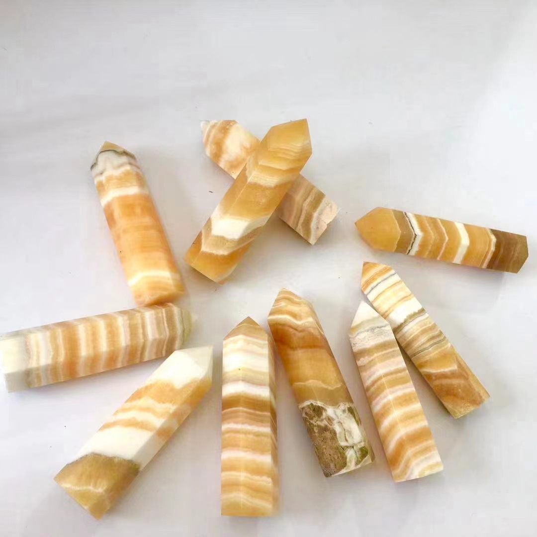 Wholesale bulk healing crystal stone natural polished orange calcite crystals gem point tower for decoration